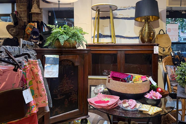 econdhand furniture, lamps, artwork, handbags, and home decor displayed inside the Housing Works Thrift Shop West Village.