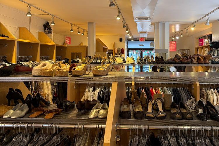Shoes and clothing displayed inside Housing Works Thrift Shop Yorkville.